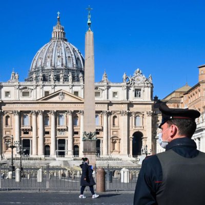 A police officer standing guard in St Peter’s Square.
