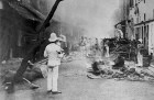 Shropshire Regiment ‘Whitewash Brigade’ emptying items from Chinese homes in Taipingshan, Hong Kong, and burning them on the street as an epidemic control measure during the 1894 plague outbreak.