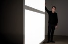 Alfredo Jaar photographed next to his installation ‘The Sound of Silence’ (2006) at Yorkshire Sculpture Park in October 2017. Photo by Jonty Wilde