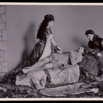Photograph taken at Balmoral in 1893/94 by Charles Albert Wilson. Ethel Cadogan, Lord William Cecil and Dr Alexander Profeit re-enact a scene from Ivanhoe by Sir Walter Scott in which Rebecca and a page kneel over Ivanhoe. Royal Collection Trust/© HM Queen Elizabeth II 2020