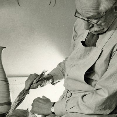 Bernard Leach working at the wheel (detail; 1963).