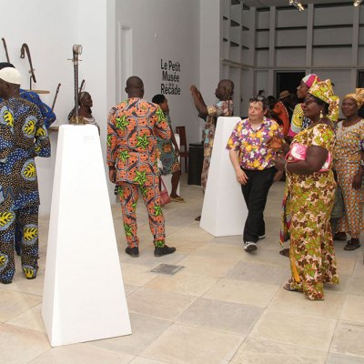 Visitors to the Petit Musée de la Récade inside the Centre for Arts and Culture in Cotonou, Benin, on 17 January 2020.