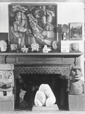 Photograph taken by Floyd Faxon in c. January 1951 of the living room, with views into the dining room through the north and south archways, of 7065 Hillside Avenue.