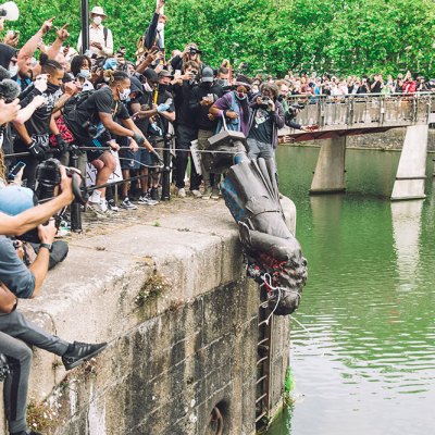 Bronze guilt: the statue of Edward Colston being pushed into Bristol Harbour in June 2020.