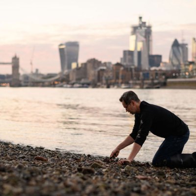 Bank vault: mudlarker Jason Sandy on the foreshore of the River Thames.