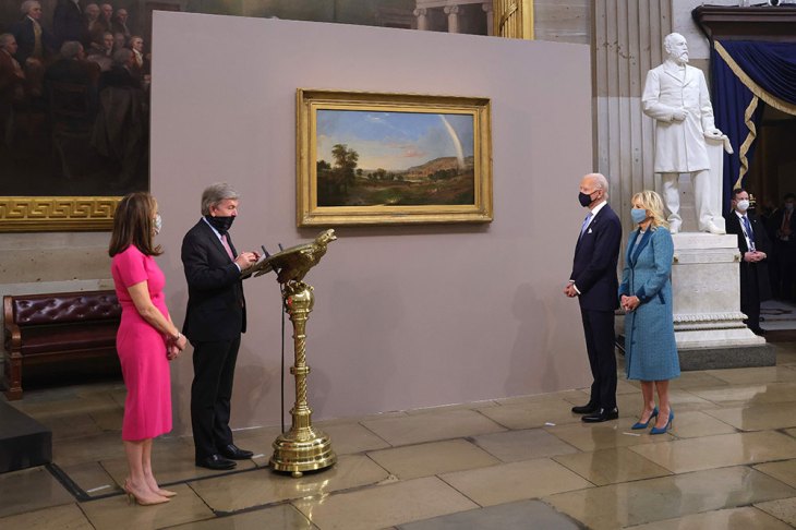 A pot of gold for the arts at the end of the rainbow? The Bidens are presented with Robert S. Duncanson's Landscape With Rainbow (1859) following the president’s inauguration.