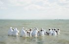 Mass Baptism, Southend-on-Sea (detail) (2013) in ‘Thames Log’ by Chloe Dewe Mathews. © Chloe Dewe Mathews