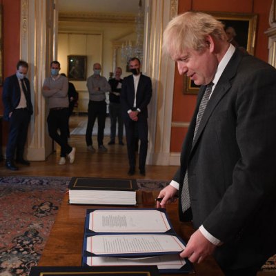 No more red tape? Boris Johnson signs the Brexit deal in December 2020.