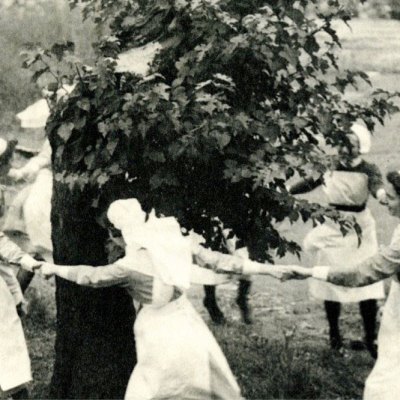 Nurses dance around the Bethnal Green mulberry in 1944, three years after it was bombed.
