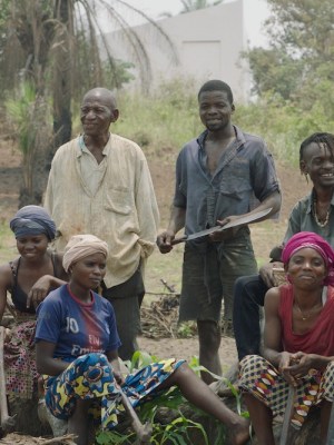 The Cercle d'Art des Travailleurs de Plantation Congolaise standing before the White Cube in Lusanga
