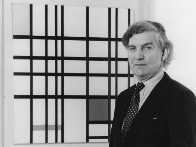Alan Bowness with Piet Mondrian’s Composition with Yellow, Blue and Red at the Tate, 1980