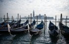 In hibernation: covered gondolas line the shore in Venice in December 2020.