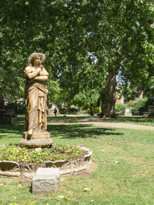 Terracotta statue of Euterpe, the Muse of instrumental music, in St George's Gardens, Bloomsbury.