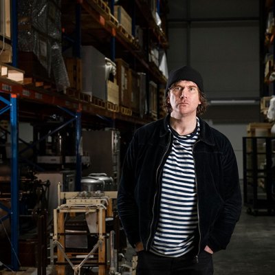 Bedwyr Williams with the Science Museum Group Collection at the National Collections Centre in Wiltshire. The artist is currently working with local audiences to create a film and accompanying book as a response to the collection, which will go in view at the collection centre when it opens to the public in 2024.