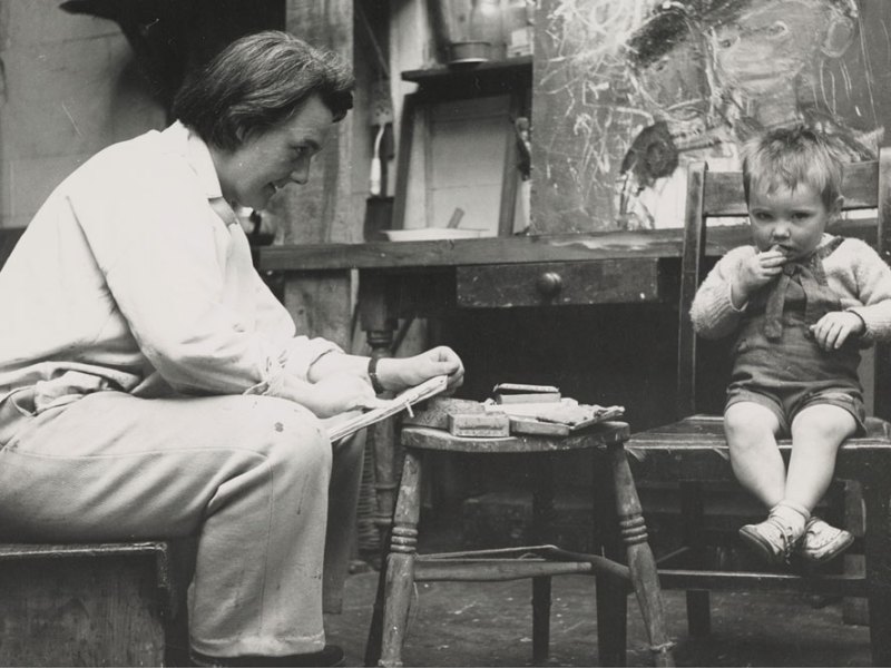 Joan Eardley sketching in her studio in Townhead, Glasgow (photo by Audrey Walker, c. 1949–51). Collection Scottish National Gallery of Modern Art