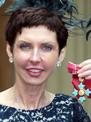 Denise Coates accepting her CBE at Buckingham Palace in 2012.