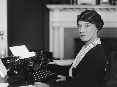 Woman working in an office in the United States, c. 1921.