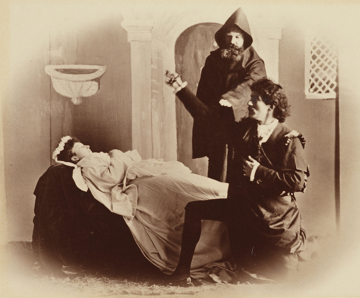 A tableau vivant at Balmoral depicting Romeo and Juliet, Act 5, Scene 3, in 1888. Princess Maud of Wales plays Juliet and Sir Fleetwood Edwards plays Romeo; photograph taken by Charles Albert Wilson.