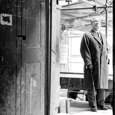 Raymond Erith inspecting work in progress at 10 Downing Street in 1962.