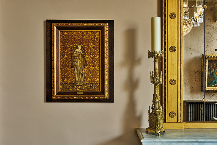 (after Burne-Jones) hangs near a Pugin-style gothic gilt candlestick.