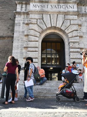 Visitors showing their ‘green pass’ at the Vatican Museums in August 2021.