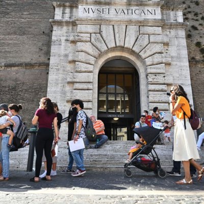 Visitors showing their ‘green pass’ at the Vatican Museums in August 2021.