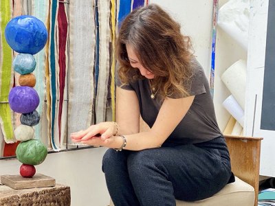 Annie Morris photographed with her work in 2020.