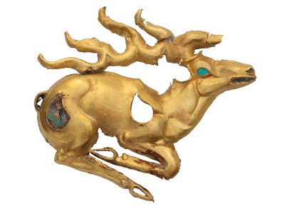 Gold recumbent stag plaque with inlays of turquoise and lapis lazuli (eighth–sixth century BC), discovered at the Eleke Sazy burial complex in Kazakhstan