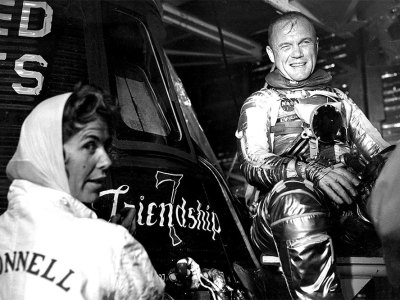 Cece Bibby (left) painting the name ‘Friendship 7’ on John Glenn’s Mercury spacecraft in 1962.