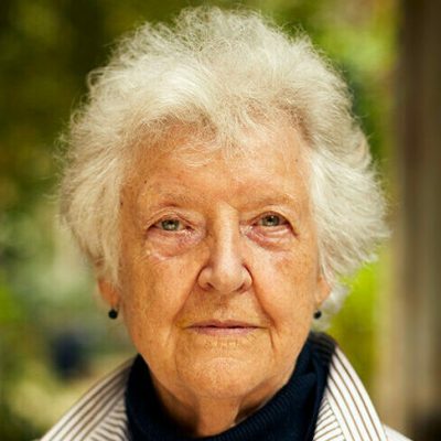 Sheila Hicks photographed in the courtyard outside her studio in Paris in August 2021.