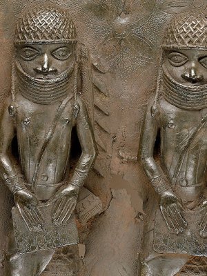 Detail of a mid 16th- to 17th-century plaque depicting two members of the Benin Court. National Museum of African Art, Smithsonian Institution, D.C.