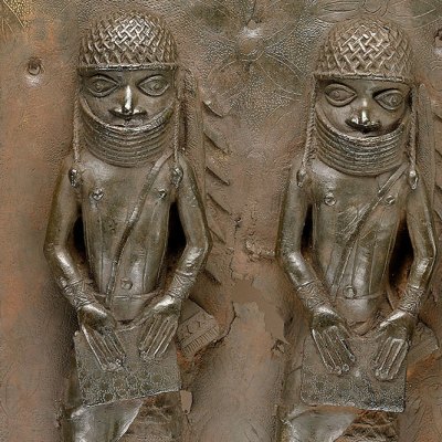 Detail of a mid 16th- to 17th-century plaque depicting two members of the Benin Court. National Museum of African Art, Smithsonian Institution, D.C.