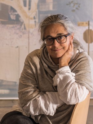 Tacita Dean, photographed in Frith Street Gallery’s Golden Square space in London, in October 2021. Behind her is one of the works in the Purgatory (2021) series.