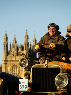 Participants driving over Westminster Bridge at the London to Brighton Veteran Car Run