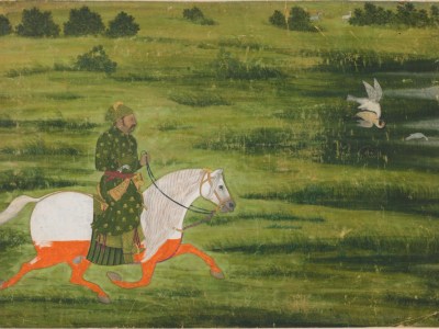 A mounted man hunting birds with a falcon (early 18th century), Kishangarh, Rajasthan state, India, Mughal dynasty.