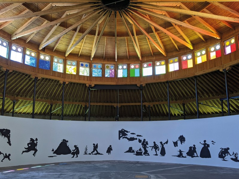 Installation view of Kara Walker’s ‘Presenting Negro Scenes Drawn Upon My Passage through the South and Reconfigured for the Benefit of Enlightened Audiences Wherever Such May Be Found, By Myself, Missus K.E.B. Walker, Colored’ (1997) and (above) Cauleen Smith’s ‘The Right Time, Before and After’ (2017) in ‘Toward Common Cause: Art, Social Change, and the MacArthur Fellows Program at 40’