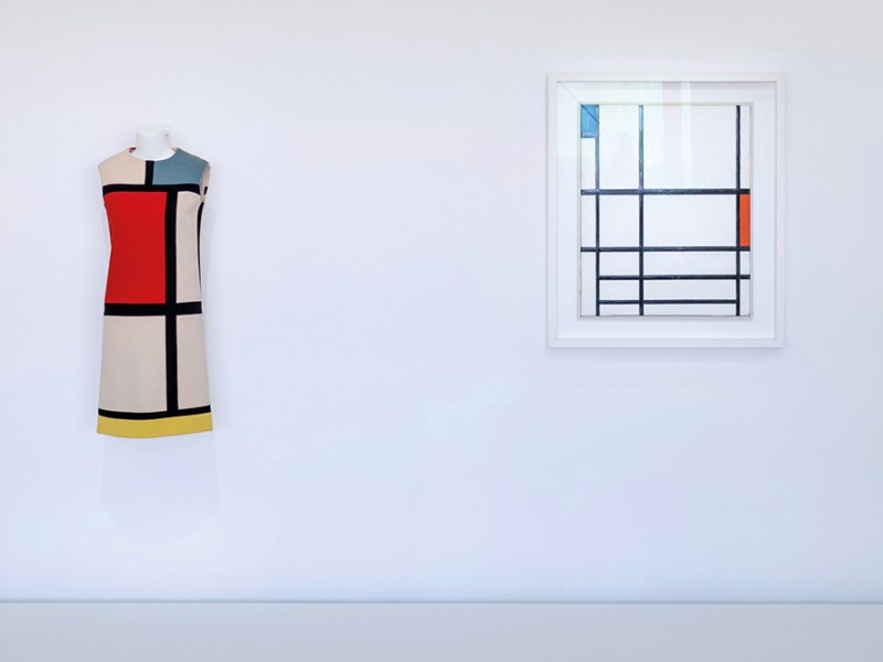 Yves Saint Laurent’s Mondrian dress (Autumn-Winter 1965), displayed next to Piet Mondrian’s Composition en rouge, bleu et blanc (1937).