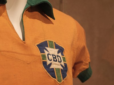 Installation view of Pelé’s shirt from the 1958 FIFA World Cup.