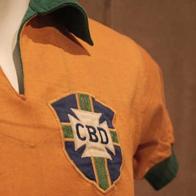 Installation view of Pelé’s shirt from the 1958 FIFA World Cup.