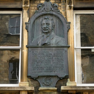 Not falling any time soon: plaque dedicated to Cecil Rhodes in King Edward Street, adjacent to Oriel College, Oxford.