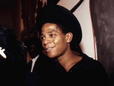 Jean-Michel Basquiat at Tony Shafrazi Gallery, New York, in 1987. Photo: Karen Petersen/Everett Collection