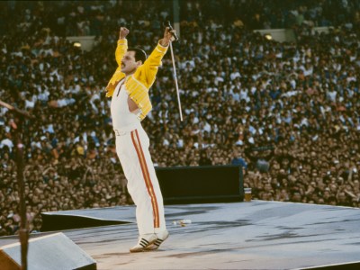 Freddie Mercury at the Queen in Concert Magic Tour at Wembley Stadium, London, in 1986. © Richard Young (www.richardyounggallery.co.uk)