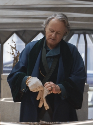 Stellan Skarsgård as antiquities dealer and spymaster in Andor. Standing in his showroom with pieces of ancient armour and jewellery