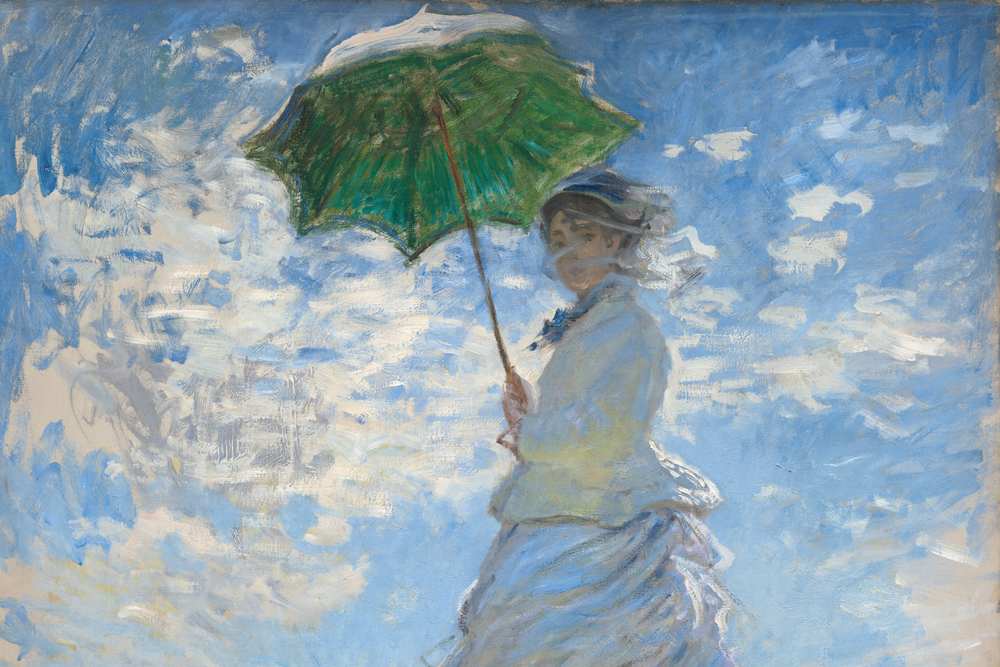 From low on a hillside, we look up at a light-skinned woman and boy standing in tall grass against a sunny blue sky in this vertical painting. The woman stands at the center of the composition, and the moss-green parasol she holds over her head almost brushes the top edge of the canvas. Her body faces our left but she turns her head to look at us. Her long dress is painted largely with strokes of pale blue and gray with a few touches of yellow. Her voluminous skirts swirl around her legs to our left. She holds the parasol with both hands, and her brown hair is covered with a hat. Long strokes of white paint across her face suggest a veil fluttering in the breeze. The tall grass she stands in is dotted with buttercup yellow and plum purple, and she casts a long diagonal shadow along the grass toward us. The young boy seems to stand on the other side of the hill, since the grass and flowers comes up to his waist. He wears a white jacket and pale yellow straw hat. His arms are by his sides, and he seems to look off into the distance to our left. A sunny blue sky behind the people is dotted with bright blue clouds. The painting is created with loose brushstrokes throughout, and they are especially choppy in the clouds. The artist signed and dated the painting in royal-blue letters at the lower right: “Claude Monet 75.” This description was taken from the website of the National Gallery of Art in Washington, D.C.