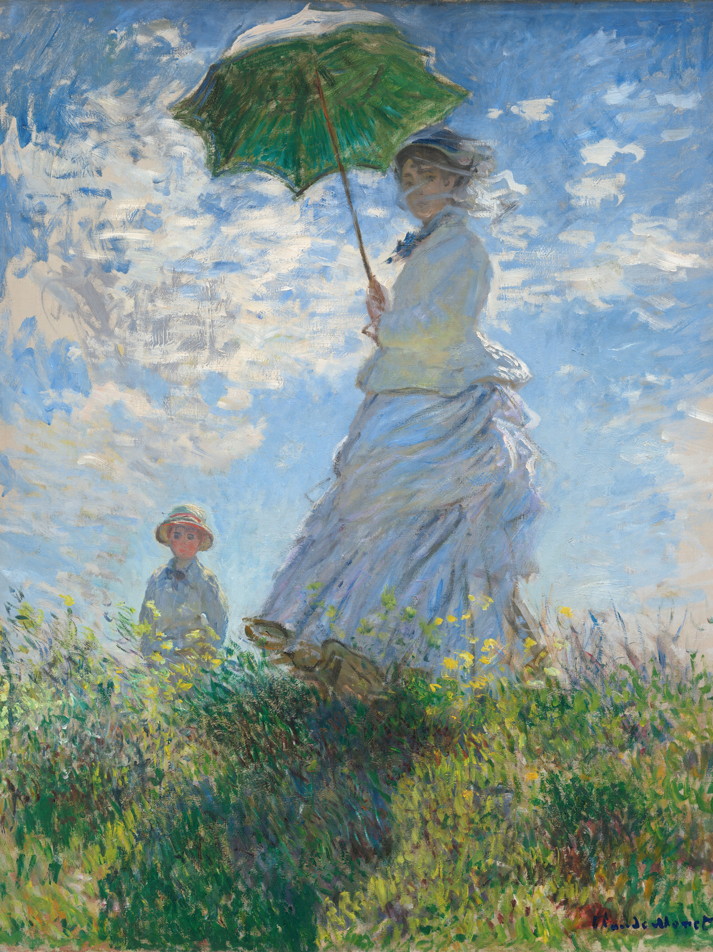 From low on a hillside, we look up at a light-skinned woman and boy standing in tall grass against a sunny blue sky in this vertical painting. The woman stands at the center of the composition, and the moss-green parasol she holds over her head almost brushes the top edge of the canvas. Her body faces our left but she turns her head to look at us. Her long dress is painted largely with strokes of pale blue and gray with a few touches of yellow. Her voluminous skirts swirl around her legs to our left. She holds the parasol with both hands, and her brown hair is covered with a hat. Long strokes of white paint across her face suggest a veil fluttering in the breeze. The tall grass she stands in is dotted with buttercup yellow and plum purple, and she casts a long diagonal shadow along the grass toward us. The young boy seems to stand on the other side of the hill, since the grass and flowers comes up to his waist. He wears a white jacket and pale yellow straw hat. His arms are by his sides, and he seems to look off into the distance to our left. A sunny blue sky behind the people is dotted with bright blue clouds. The painting is created with loose brushstrokes throughout, and they are especially choppy in the clouds. The artist signed and dated the painting in royal-blue letters at the lower right: “Claude Monet 75.” This description was taken from the website of the National Gallery of Art in Washington, D.C.