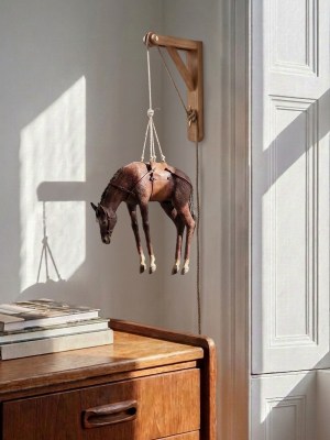 Maurizio Cattelan takes on the neighsayers